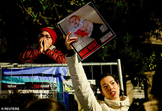 Families of hostages and supporters take part in a protest to call for the immediate release of hostages in Gaza, outside the Israeli Prime Minister's residence, in Jerusalem, January 22, 2024