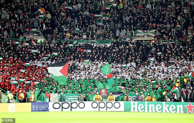 Celtic fans defied a ban by their club on displaying Palestinian flags during the Champions League match