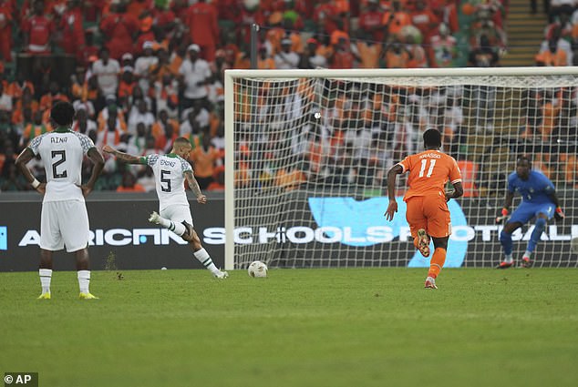 Ola Aina fouled Victor Osimhen and Troost-Ekong blasted his penalty through the middle