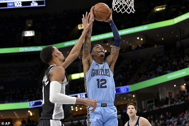 Ja Morant (12) threw down a monster dunk on Victor Wembanyama in a 106-98 victory