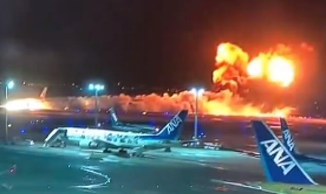 A Japanese Airlines plane caught fire at Tokyo's Haneda Airport