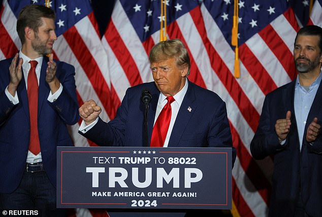 Former President Donald Trump with his sons Eric (left) and Don Jr (right) after his victory in Iowa