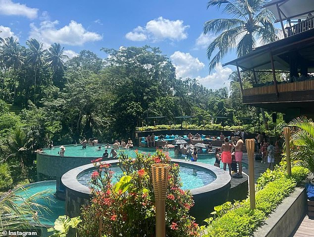 The pair enjoyed a dip at one of the Indonesian island's famous resorts