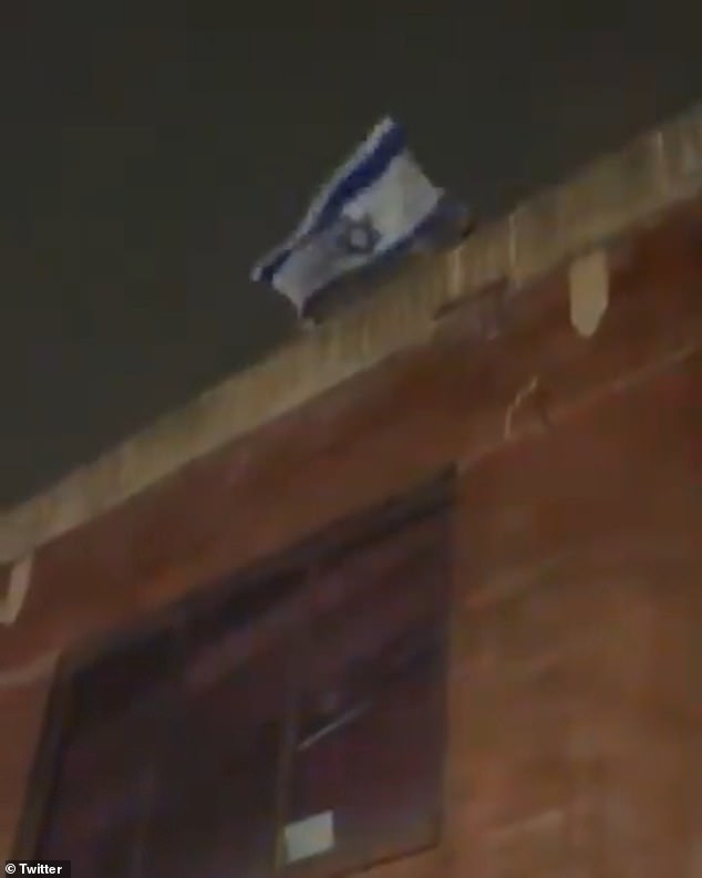 Fetterman waved an Israeli flag after pro-Gaza demonstrators demonstrated at his home on Friday