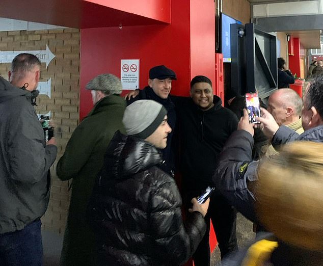 Former Chelsea captain John Terry is pictured sitting at Anfield watching the Blues take on Liverpool in their Premier League match