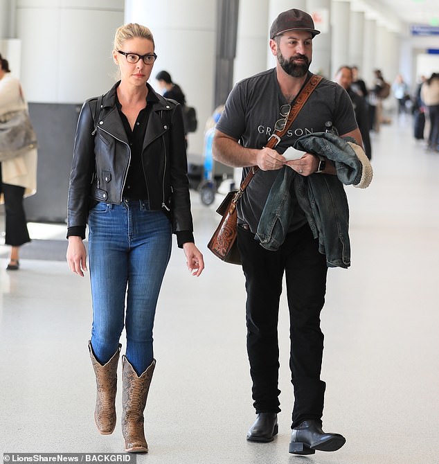 Katherine Heigl and her husband Josh Kelley were spotted making their way through LAX Airport in Los Angeles on Wednesday morning