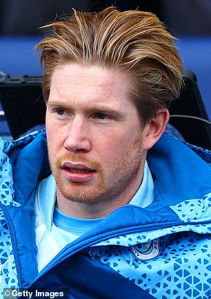 The Man City midfielder, pictured on the bench during their FA Cup tie against Burnley, has started growing his hair during his injury layoff