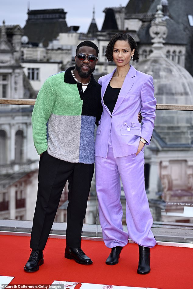 Kevin Hart, 44, and Gugu Mbatha-Raw, 40, put on a stylish look as they posed together for Netflix's Lift photocall at the Corinthia Hotel in London on Thursday