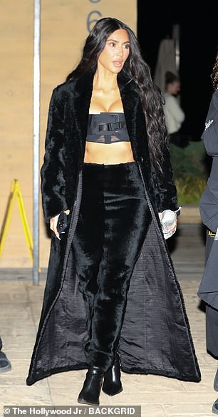 For their midweek reunion, Kardashian put on a stylish show in a super cropped tube top paired with high-waisted pants made of velor or fur.