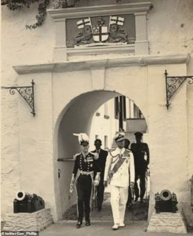 The late Prince Phillip was photographed walking through the exact same arch in 1957