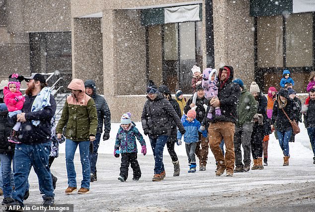 Crowds walk to a show at the Southern New Hampshire University Arena in Manchester, New Hampshire on Sunday