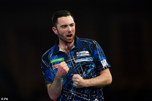 Luke Humphries reaches first World Darts Championship semi final after thrashing