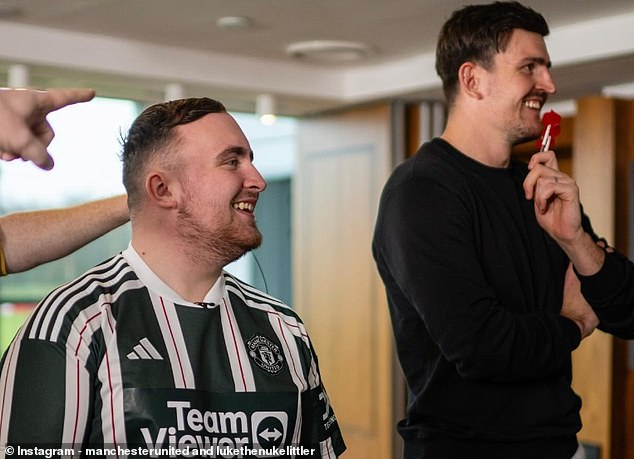 Luke Littler, Harry Maguire and Christian Eriksen faced off in a darts showdown at Man United's Carrington training center