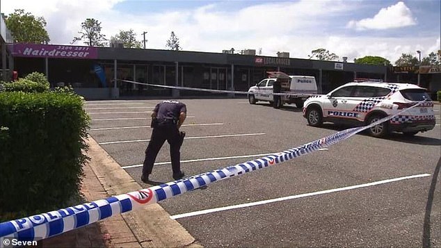 The man suffered a serious laceration when he was attacked at a shopping village on Bailey Road in Deception Bay, north of Brisbane, at 12.45pm on Thursday (scene pictured)