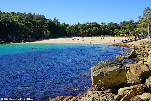 The 32-year-old woman was pulled from the water at Shelly Beach in Manly, on Sydney's northern beaches, just before 1pm on Wednesday.