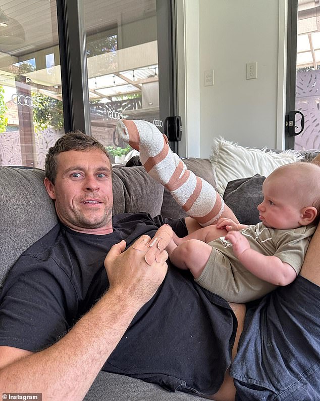 Ryan Gallagher hurt himself with an angle grinder and shared the results of the bloody injury on Instagram.  Pictured with his son