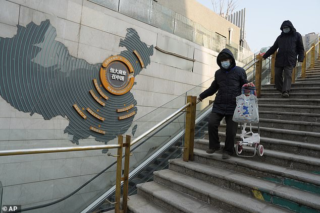 Chinese real estate giant Evergrande has gone bankrupt, potentially threatening demand for Australian iron ore used to make steel (pictured is a commercial complex in Beijing's Evergrande)