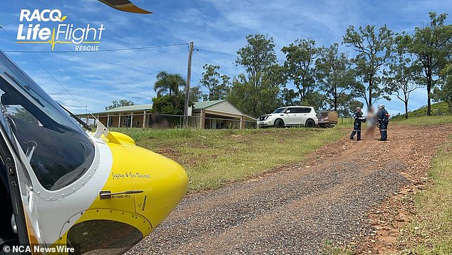 RACQ LifeFlight Rescue transports a woman in labor trapped by flooding (photo)