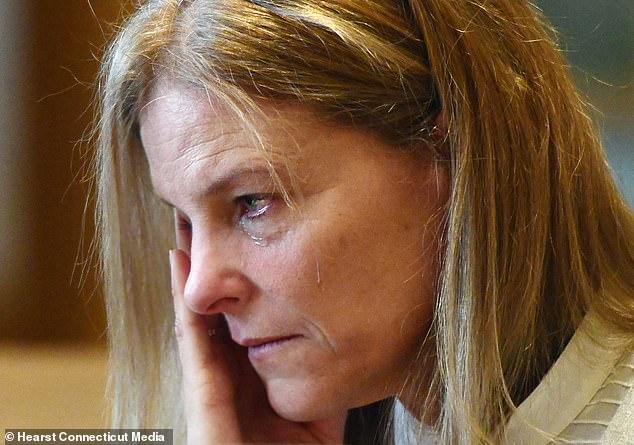 Michelle Troconis cried in court as a detective debunked her apparent lie about having showered with her boyfriend the morning he killed his estranged wife