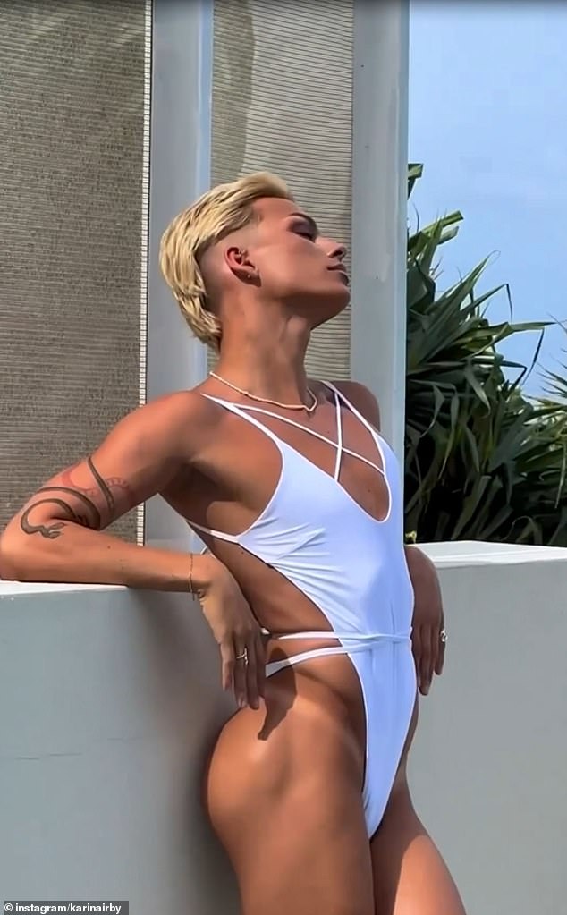 Australian swimwear brand Moana Bikini has come under fire after sharing a video of male model Jake Young (pictured) posing in a women's swimsuit