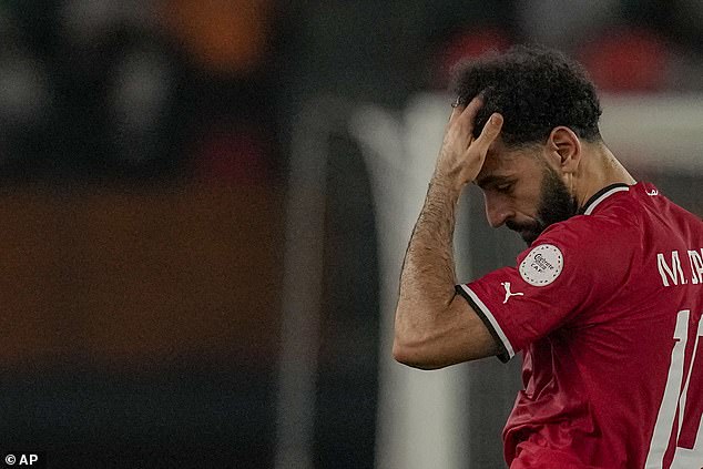 Mohamed Salah is forced off INJURED in first half of