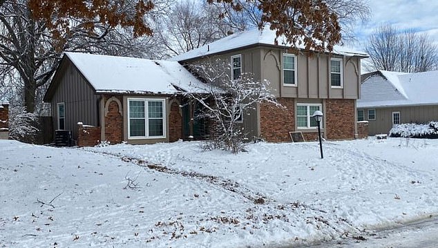 The owner of the house (pictured) told police that the men had frozen to death in his backyard.  Their loved ones have raised questions about the lack of coverage of their bodies, and the snow they say was not deep enough to submerge them