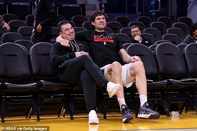 Fellow Serbs Dejan Milojevic (left) and Houston Rockets center Boban Marjanovic (right)