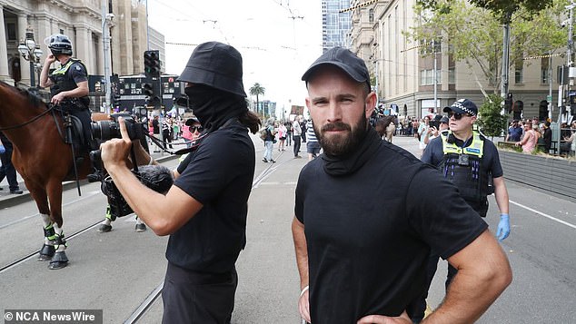 At North Turramurra on Sydney's north shore, group leader Thomas Sewell (pictured, right) was granted an extension of the public safety order on Saturday evening, banning him from several parts of Sydney until midnight on Sunday.