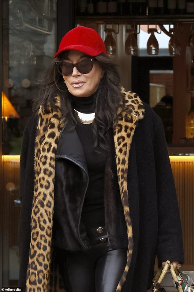 Nancy Dell'Olio, 62, wore a stylish leopard print coat as she left her West London hotel on Friday after revealing her plans to reunite with ex Sven-Goran Eriksson amid his terminal cancer diagnosis