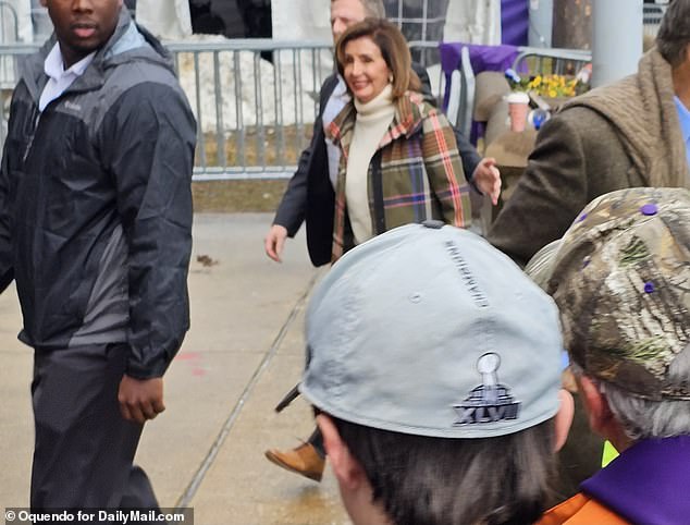 Nancy Pelosi arrived in a black SUV for the AFC Championship game on Sunday afternoon