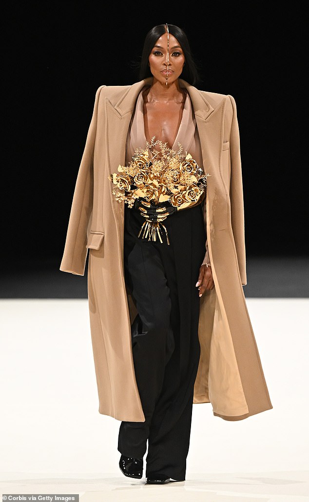 She made sure all eyes were on her as she strutted her stuff down the catwalk at the Balmain Menswear show on Saturday