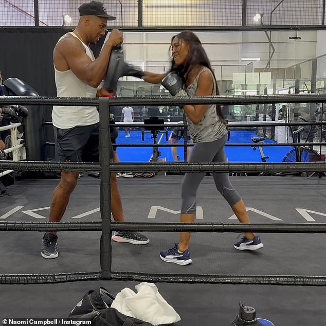 Naomi Campbell made a splash as she entered the boxing ring with Anthony Joshua for New Year's training on Tuesday