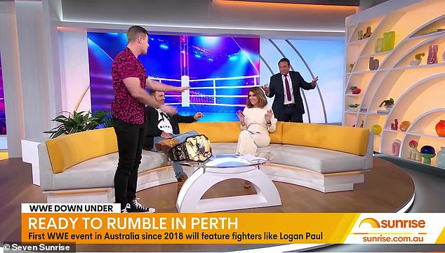 Natalie Barr suffered a rather awkward moment while interviewing rival WWE stars Grayson Waller and LA Knight during Tuesday's episode of Sunrise.  (Pictured with co-host Matt Doran)