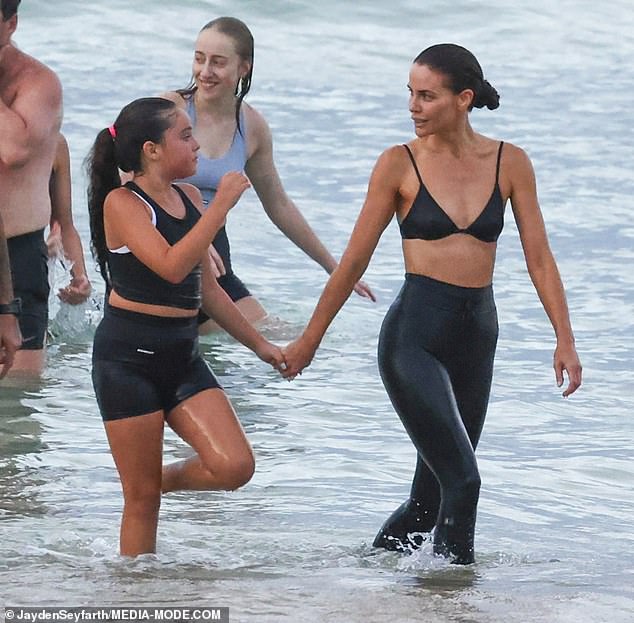 Jodi Gordon looked as fit as a fiddle during a training session on the Sydney beach with her mini-me daughter Aleeia, nine, this weekend