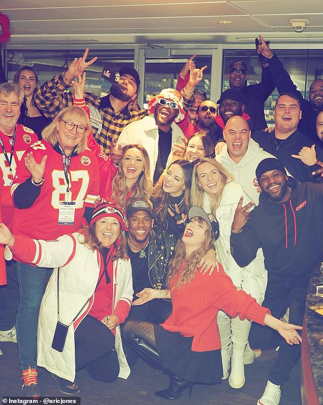 Taylor was also seen in a large group photo, with Travis' close friends and his parents