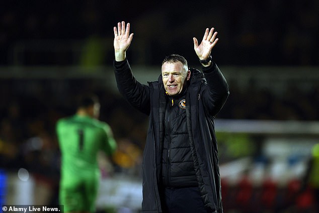 Newport County boss Graham Coughlan joked his Man United-mad family will be left out this weekend if they support the Red Devils