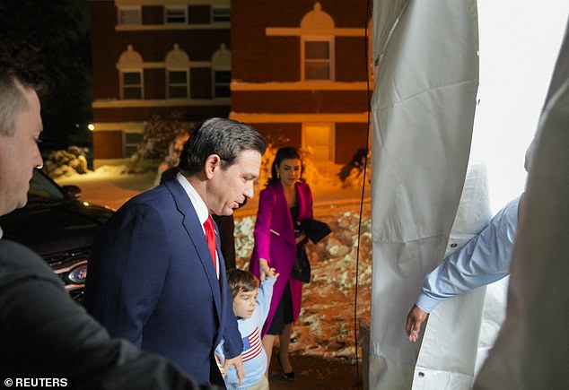 Gov. DeSantis arrives for the CNN debate Wednesday night.  Florida First Lady Casey DeSantis and son Mason, five, arrive with the 2024 hopeful