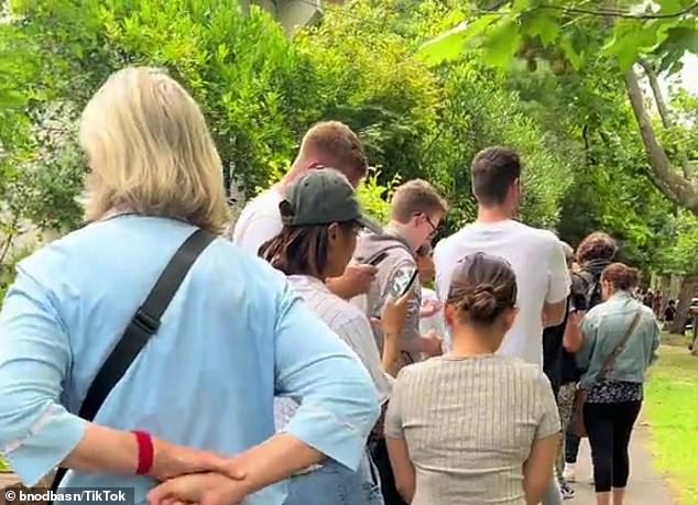 The line to inspect the unit in Flemington, in Melbourne's northwest, snaked out of the building's carport and spilled onto the street.