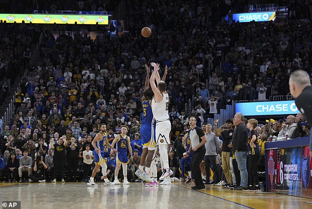 Jokic stayed inside the right sideline for the winning shot from near the Warriors bench