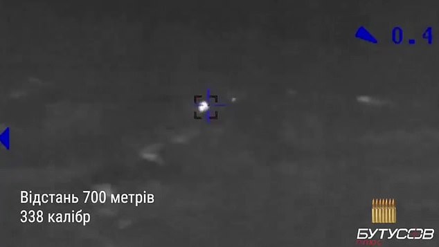 Footage discovered earlier this month showed the thermal imaging scope used in the crack shots revealing Russian soldiers rushing through a wooded area