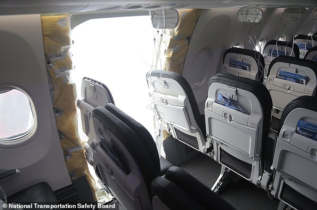 The Boeing 737 Max 9 plane was just minutes into its journey from Portland, Oregon, to California when the unused exit door blew open and came loose.  Pictured: Post-accident interior view, showing the missing door plug and damaged seats