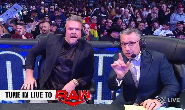 Pat McAfee (L) joins WWE's Monday Night Raw as a commentator with Michael Cole