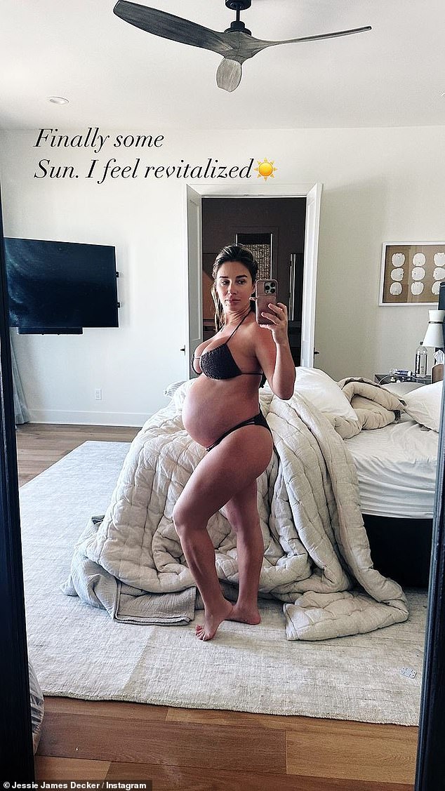 Jessie James Decker showed off her growing baby bump this week while vacationing with her family to a tropical destination