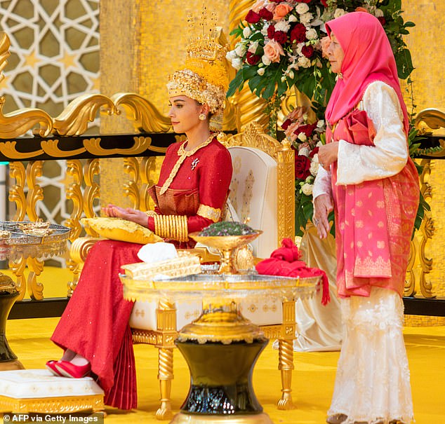 Yang Mulia Anisha Rosnah, 29, looked sophisticated at the elaborate, centuries-old ceremony at Istana Nurul Iman