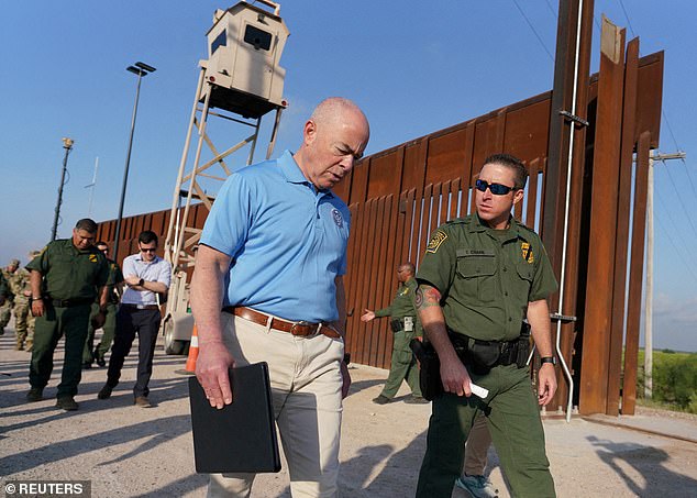 Homeland Security Secretary Alejandro Mayorkas listened to Deputy Patrol Agent in Charge Anthony Crane last week