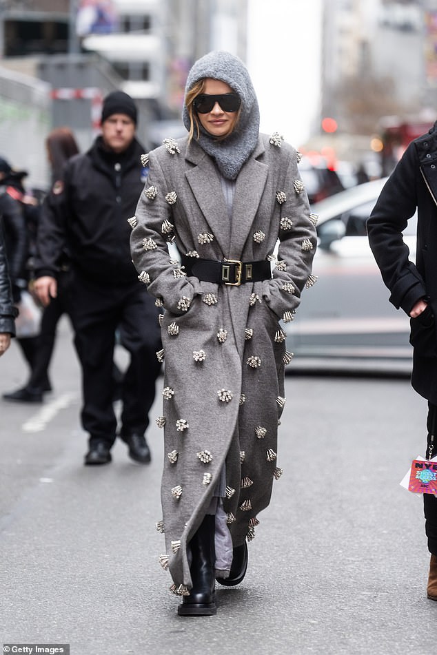 Rita Ora opted for quirky attire as she hit New York's Times Square ahead of her performance on Dick Clark's New Year's Rockin' Eve with Ryan Seacrest on Sunday