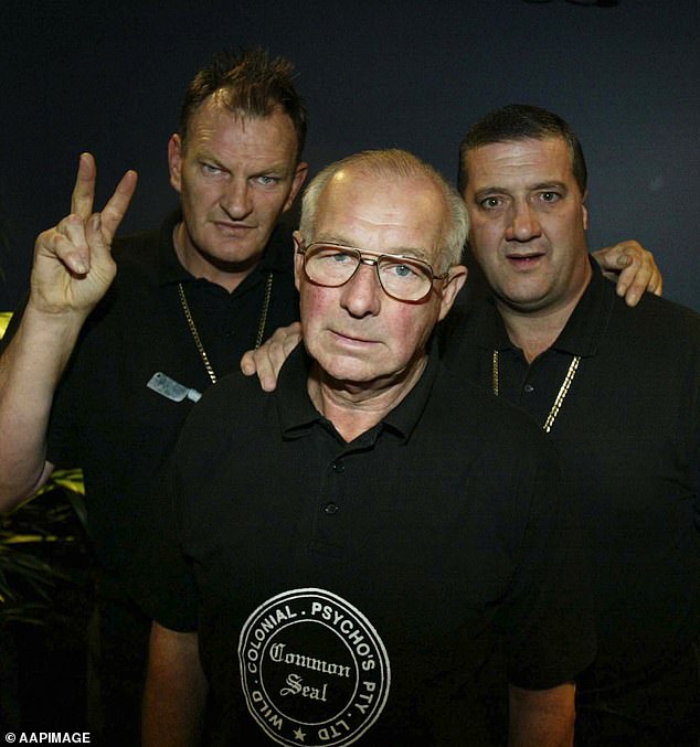 Roger Rogerson often bragged about the thugs he killed during his years as a Sydney detective.  He is pictured center on the speaking circuit with late Melbourne criminal and author Mark 'Chopper' Read (right) and former AFL player Mark 'Jacko' Jackson