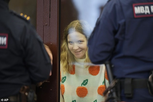 Hardline military blogger Vladlen Tatarsky died when a miniature statue presented to him as a gift by Darya Trepova (pictured in court today) exploded in a St. Petersburg cafe last April.