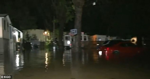 Early morning flooding hit the city of Guerneville, north of San Francisco, where a creek overflowed after more than 4 inches of rain fell in 24 hours.