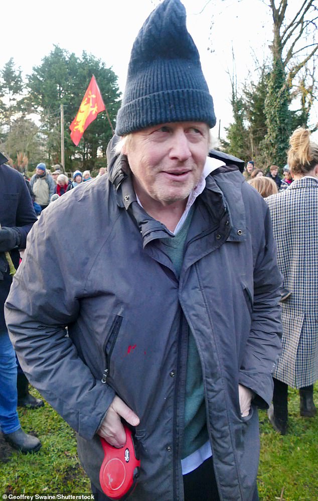 Boris Johnson and his wife Carrie Johnson were today spotted on a family day out at Brightwell cum Sotwell in Oxfordshire taking part in a traditional Wassail ceremony